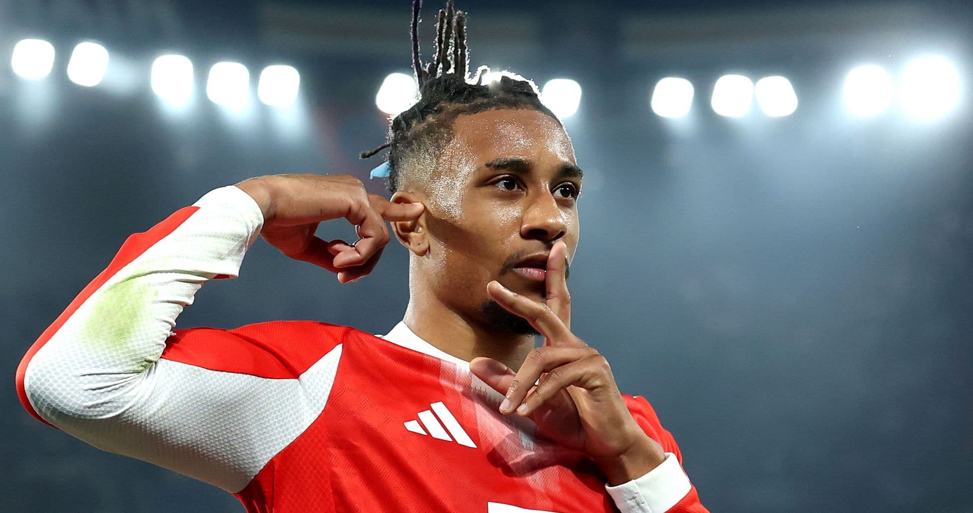Player celebrating with finger on lips gesture