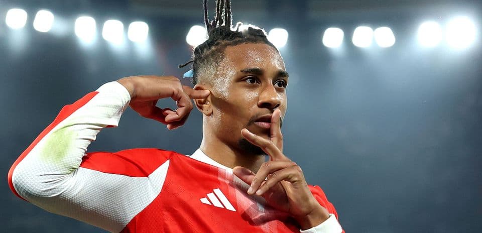 Player celebrating with finger on lips gesture