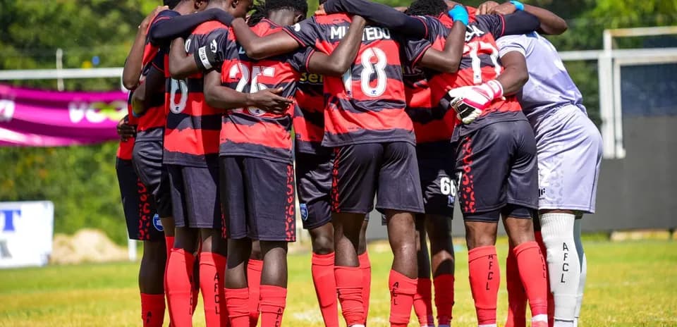 AFCL players huddling before the match