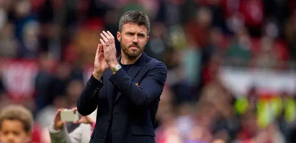 Manager applauding fans in the stadium stands