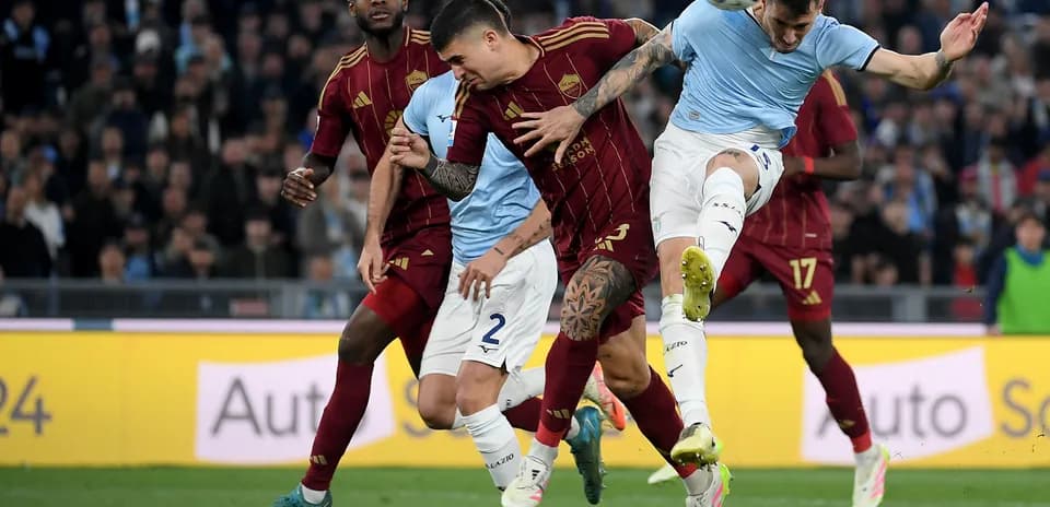 AS Roma players contesting a header against Lazio