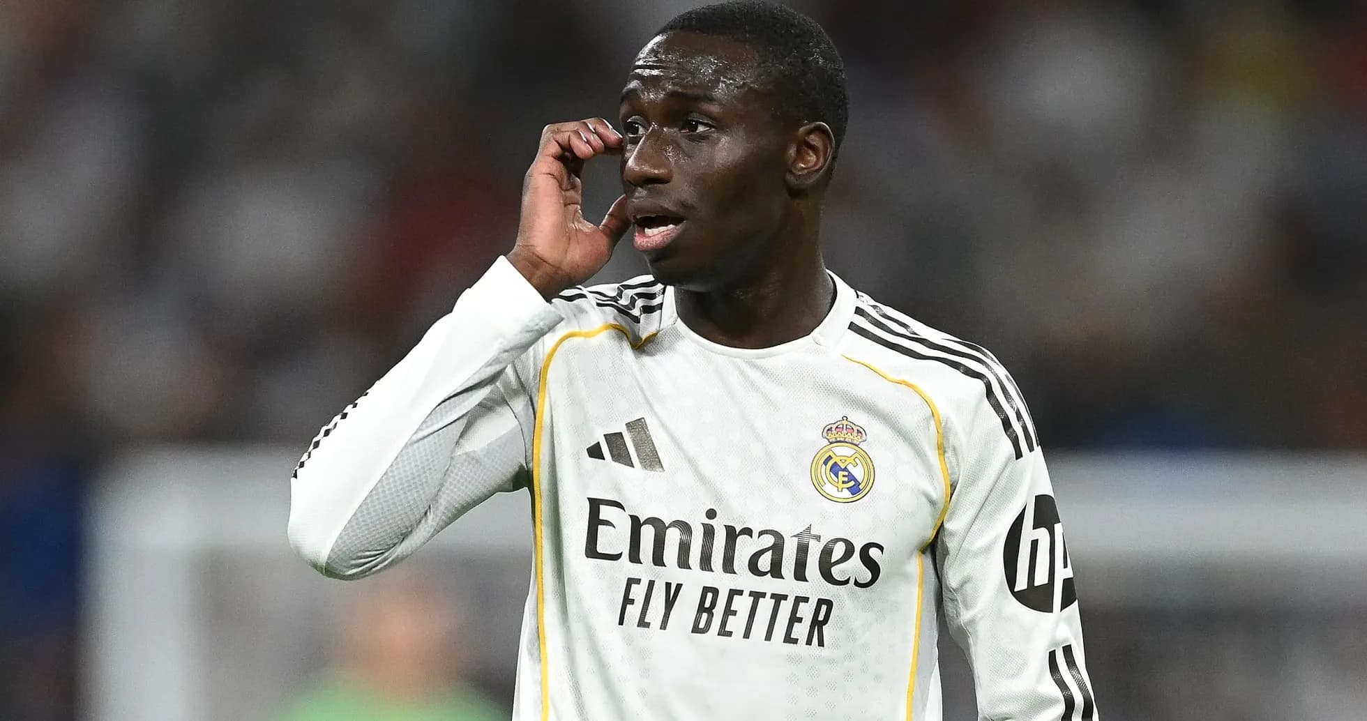 Player in Real Madrid kit during match action
