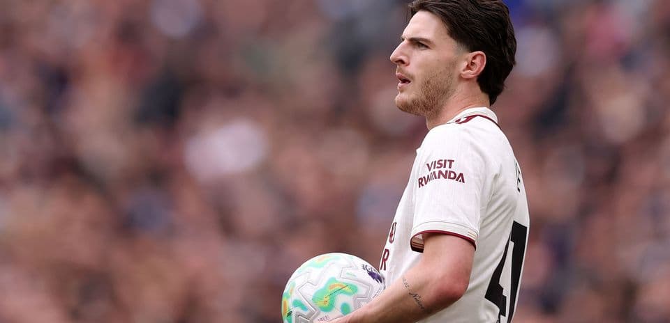 Player holding ball during match on field