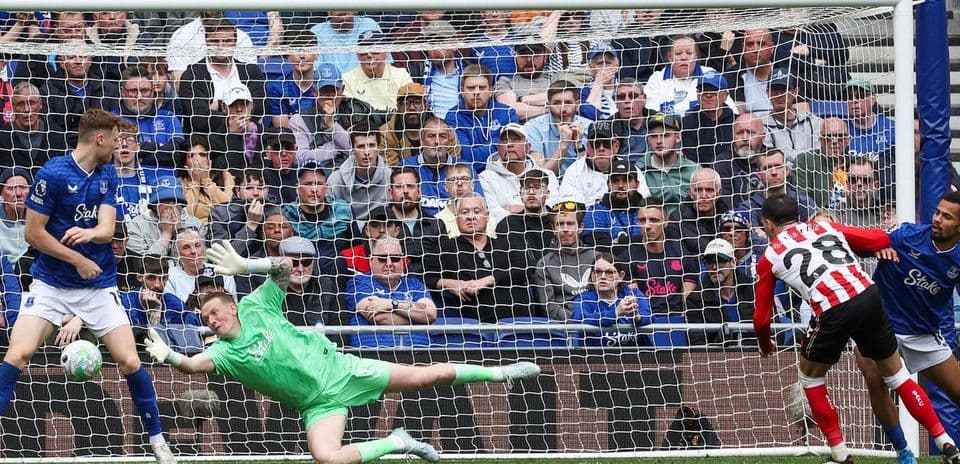 Goalkeeper saves penalty during Everton match