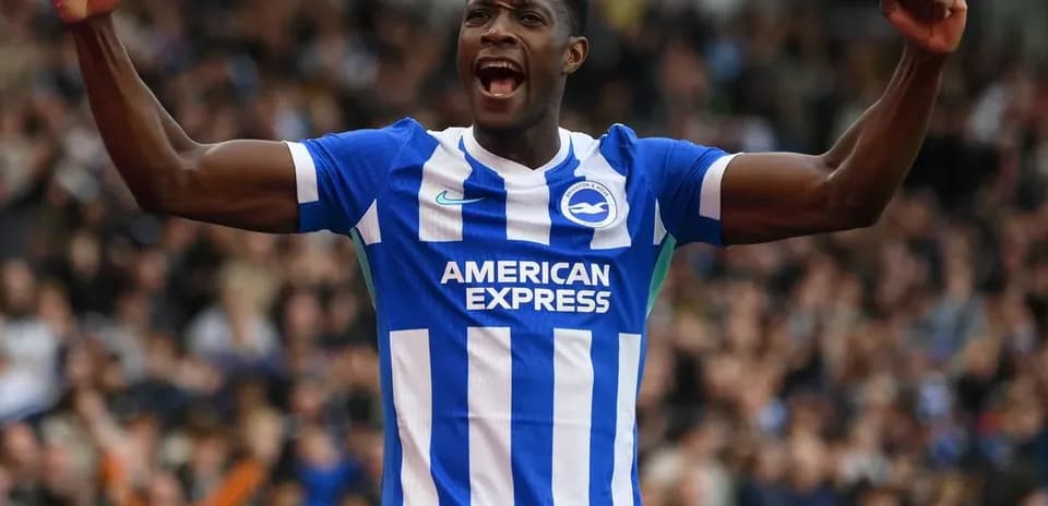 Player celebrating a goal in Brighton kit