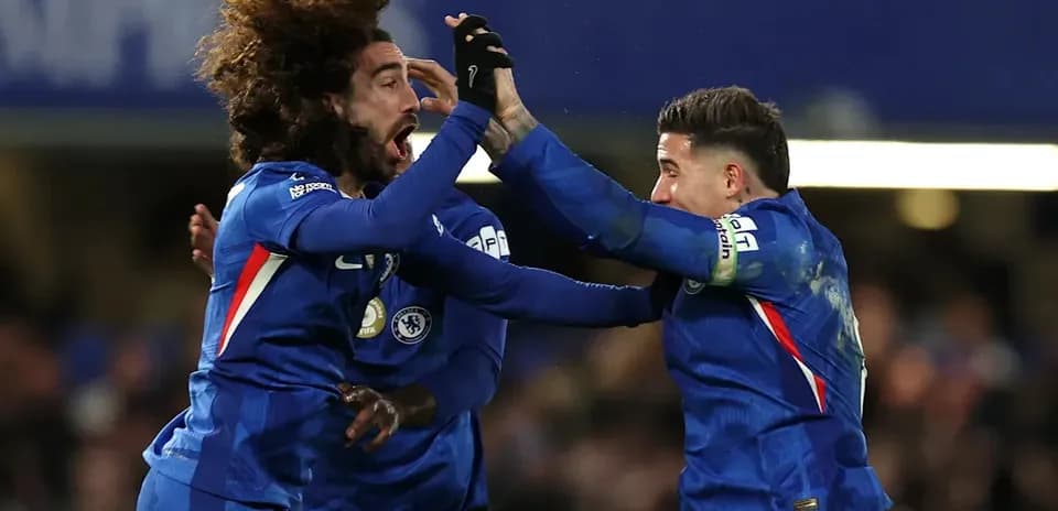Chelsea players celebrating a goal together