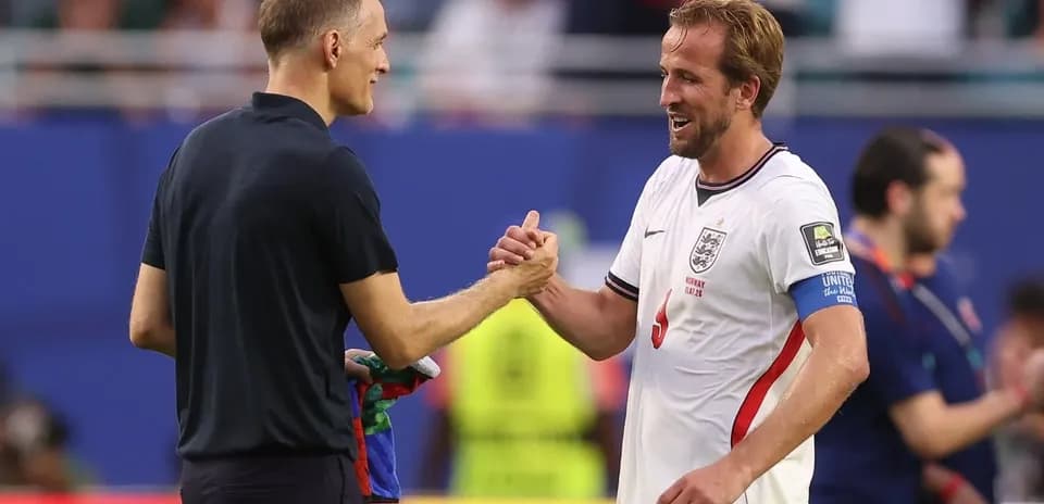 Coach and player shaking hands after the match