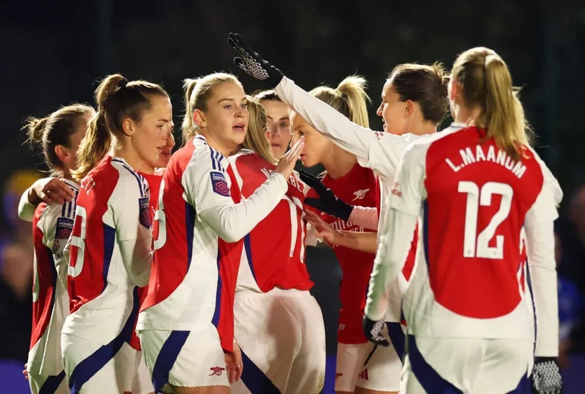 Arsenal W players celebrating during a match