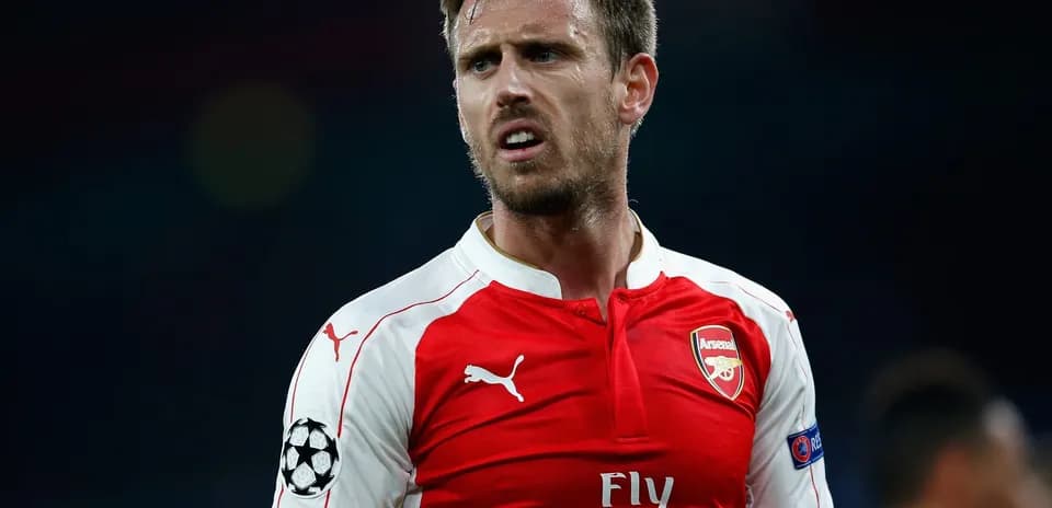 Player in Arsenal jersey during match action