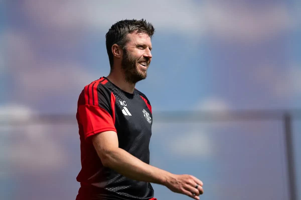 Coach in training kit during a sunny session