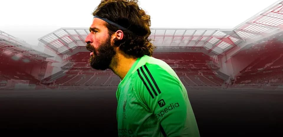 Goalkeeper in green kit at stadium background