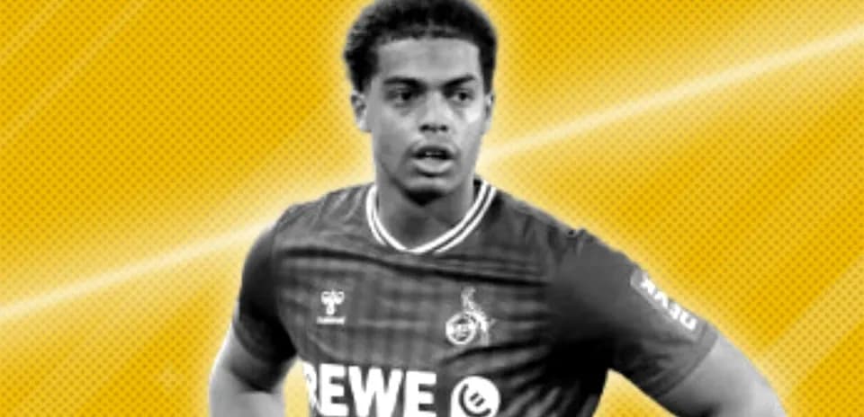 Player in REWE jersey against yellow background