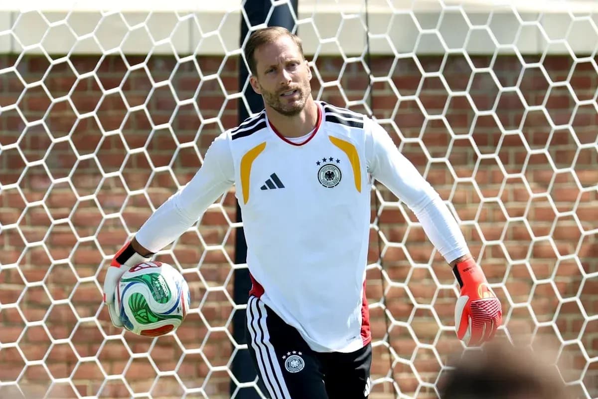 Goalkeeper holding ball during training session