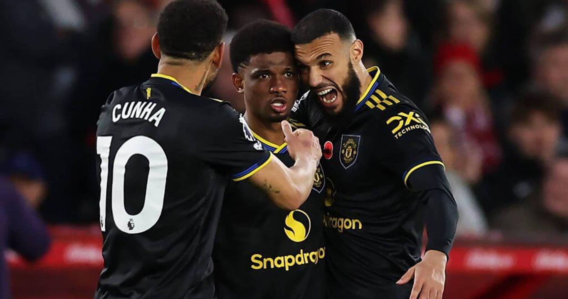 Manchester United players celebrating a goal