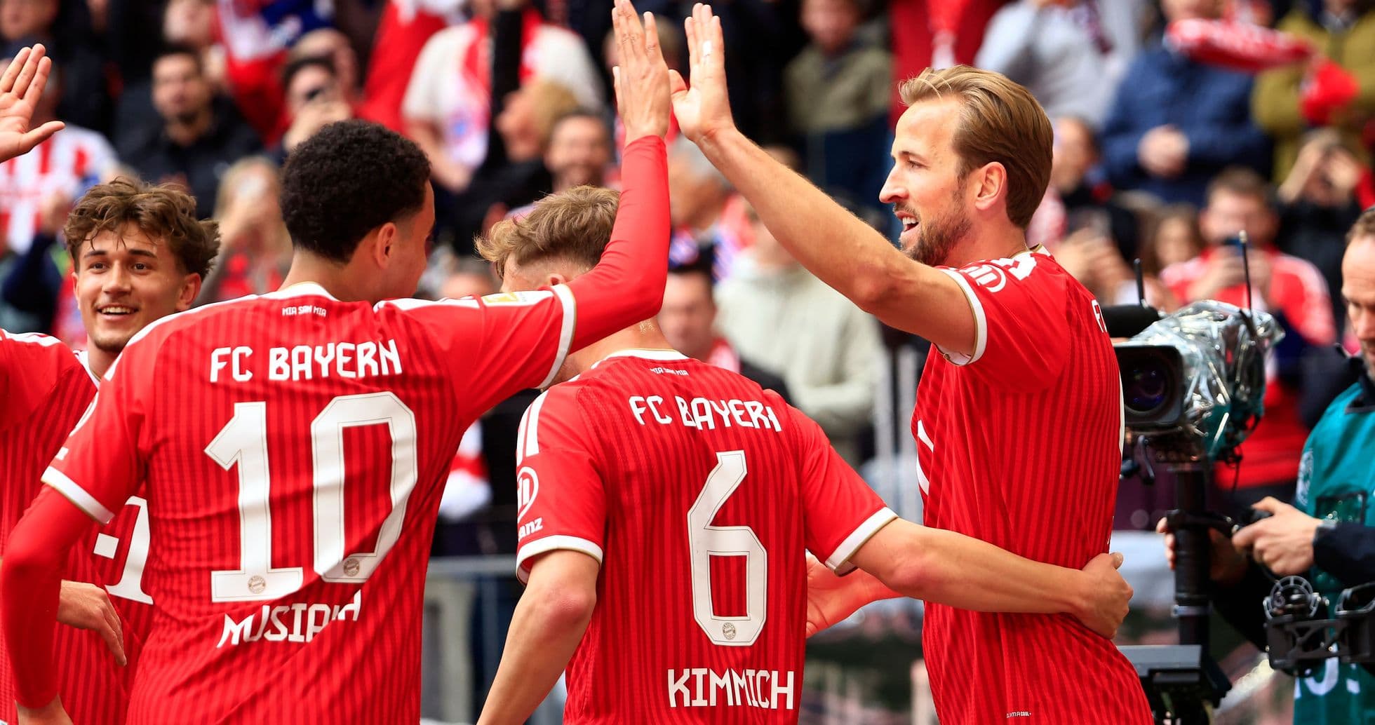 Bayern Munich players celebrating a goal together