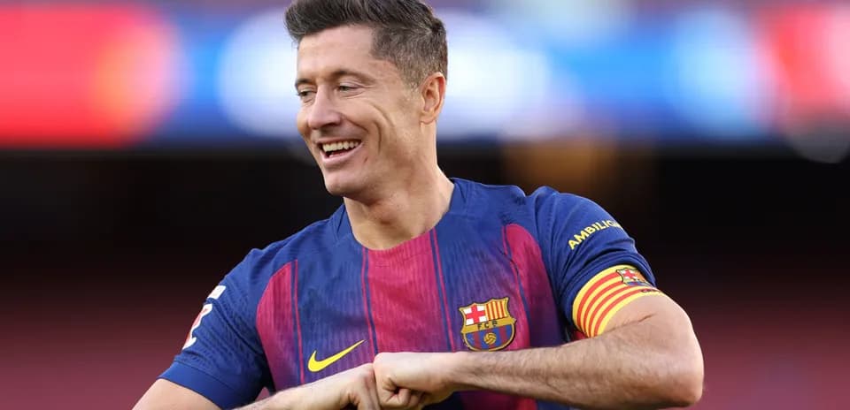 Player in Barcelona jersey celebrating on the pitch