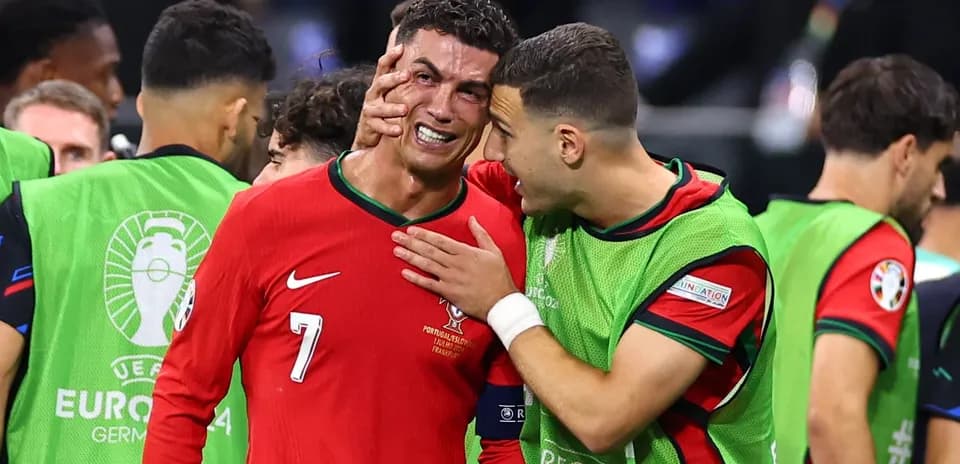 Cristiano Ronaldo reacting with teammate after match
