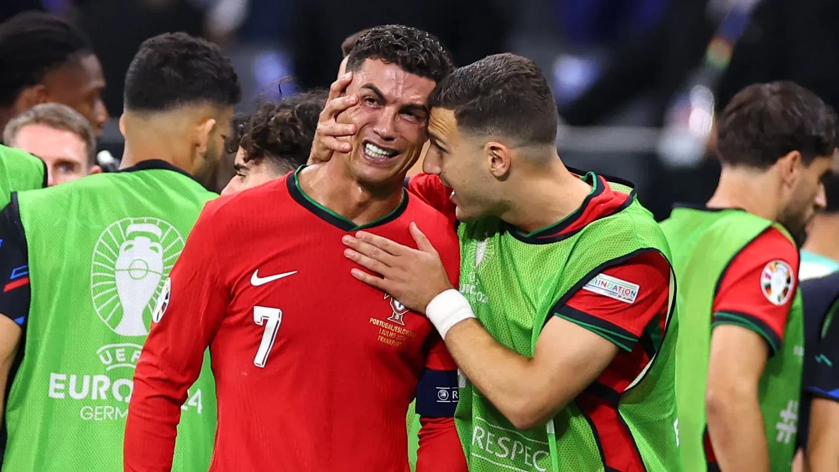 Cristiano Ronaldo reacting with teammate after match