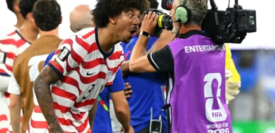 US player celebrating in front of camera after match