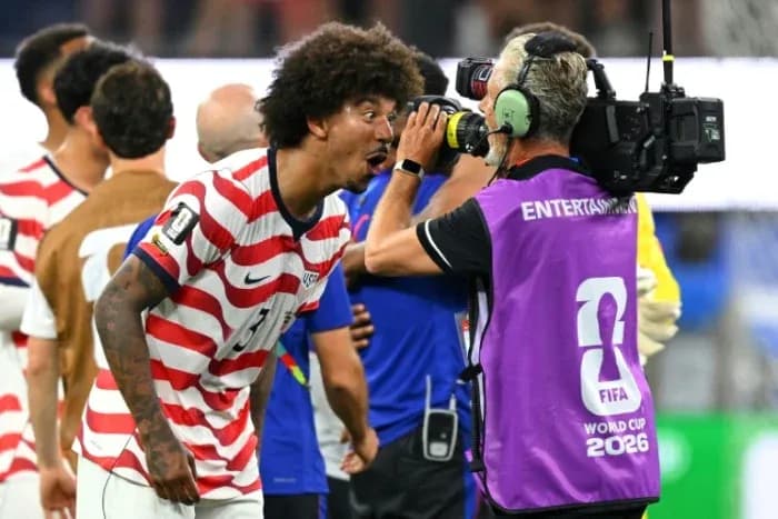US player celebrating in front of camera after match