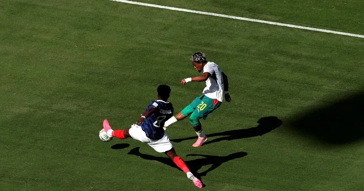 Player attempting to dribble past opponent on field