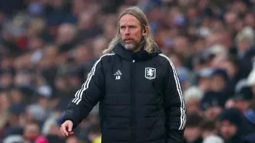 Manager on the sidelines during a match