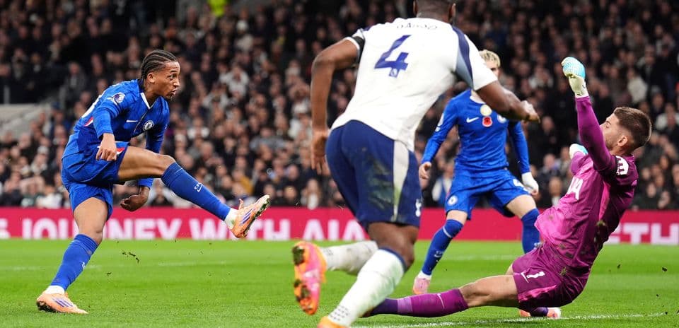 Chelsea player attempts to score against Tottenham