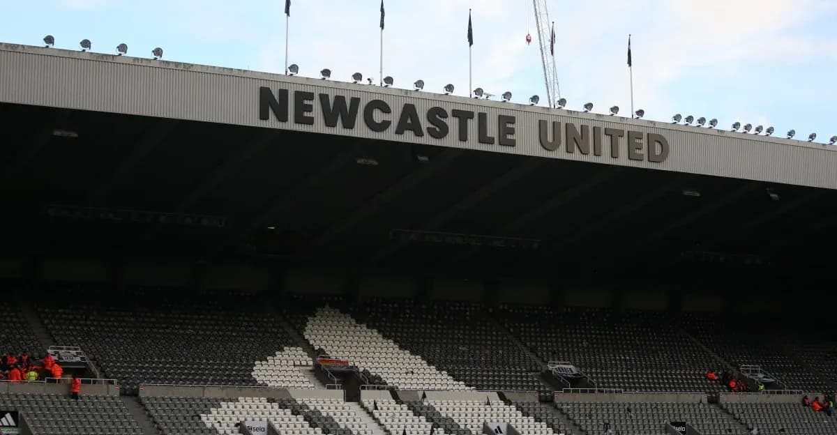 Stadium seating with Newcastle United signage overhead