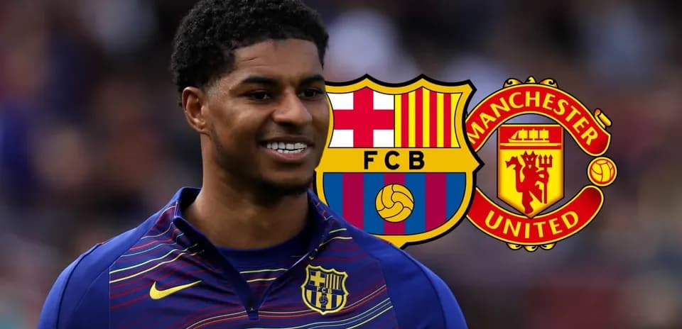 Player smiling with FC Barcelona and Manchester United logos