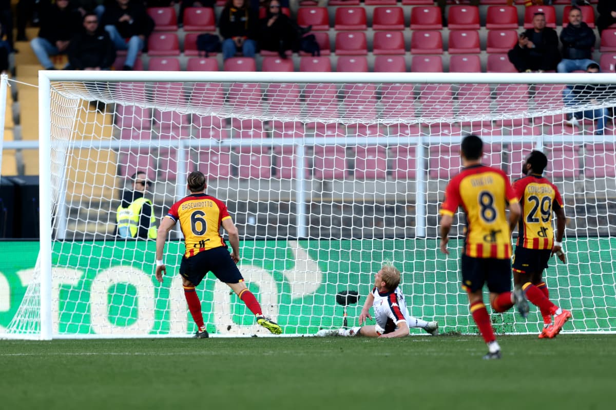 Lecce player scores against Genoa in Serie A Lecce player scores against Genoa in Serie A