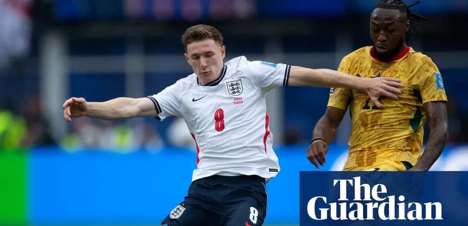 England player tackling opponent during match action