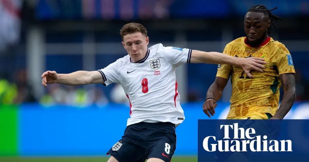 England player tackling opponent during match action