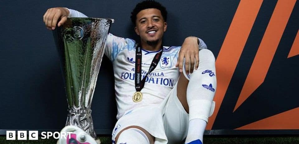 Player celebrating with trophy after match victory
