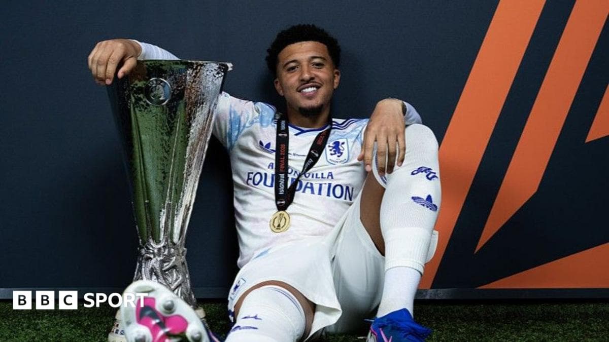 Player celebrating with trophy after match victory