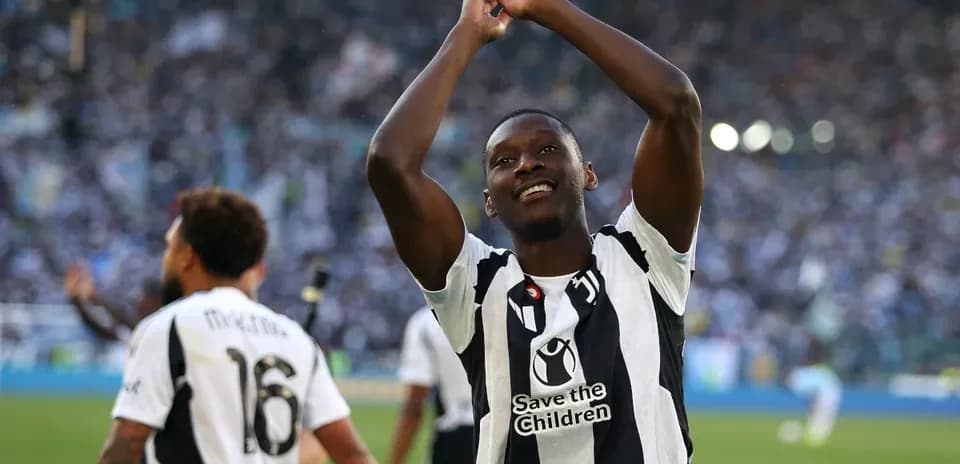 Player celebrating with fans during a match