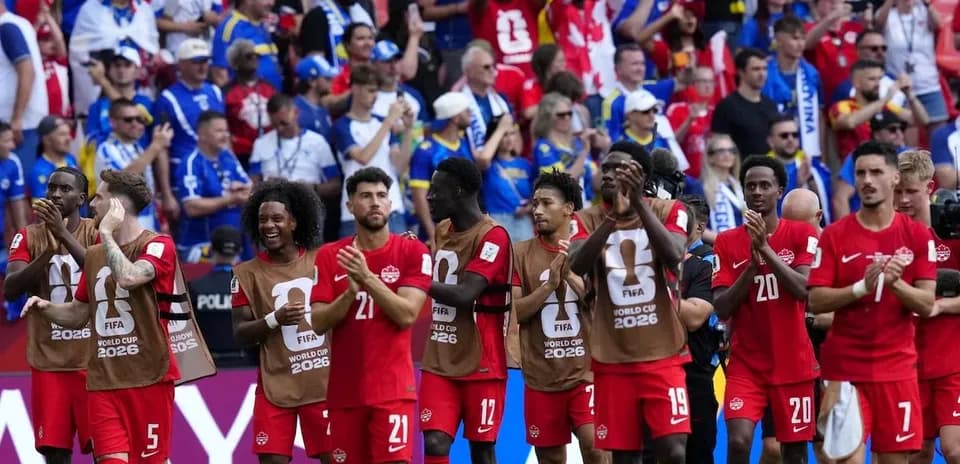 Canada players applauding fans after the match