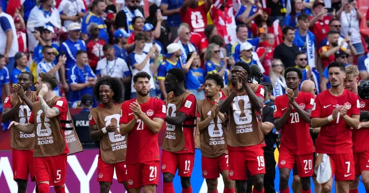 Canada players applauding fans after the match
