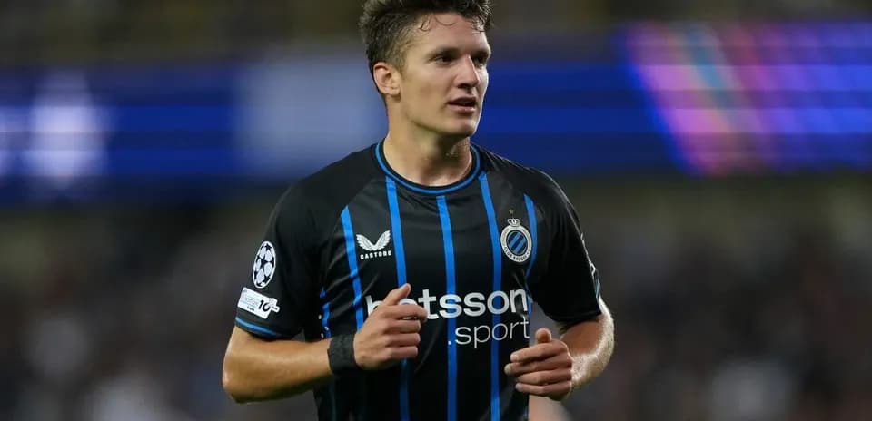 Player in Club Brugge jersey during match action
