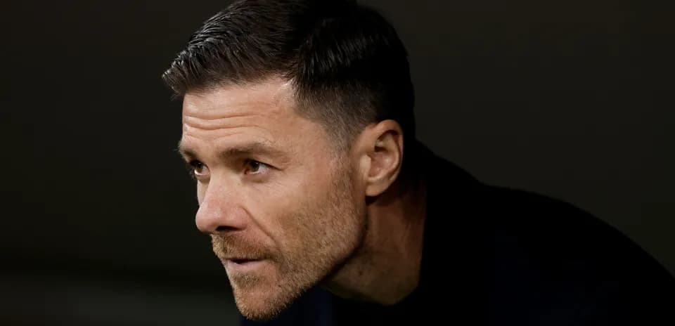 Coach focused during match from the sidelines