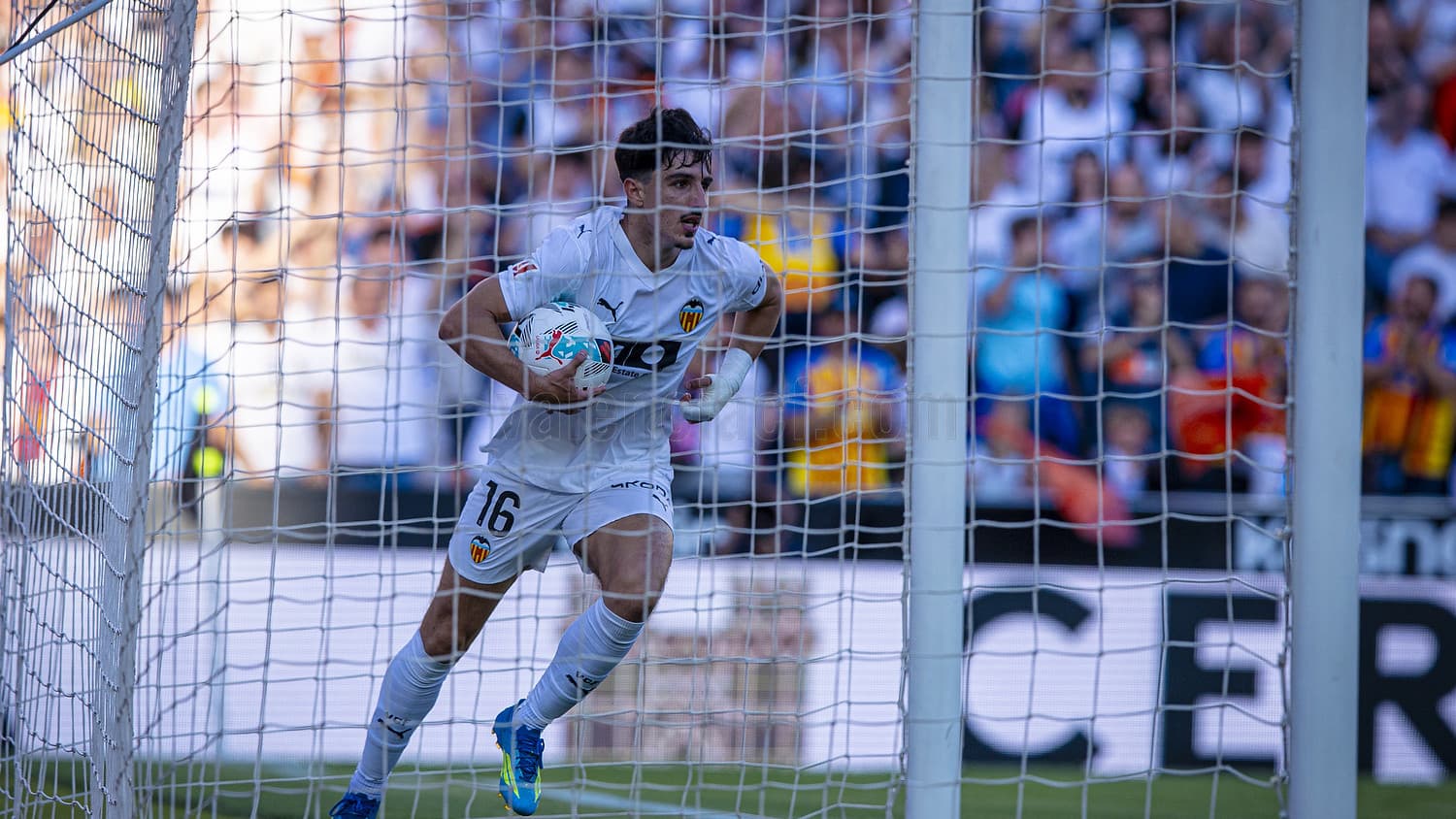 Valencia goalkeeper celebrating a save