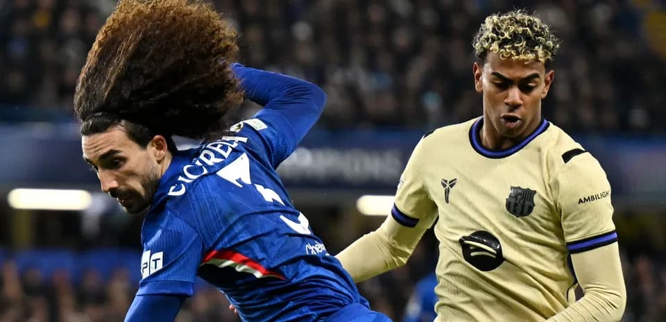 Two players competing for the ball during match