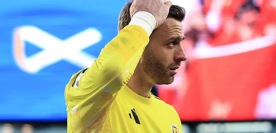 Goalkeeper in yellow jersey during match action
