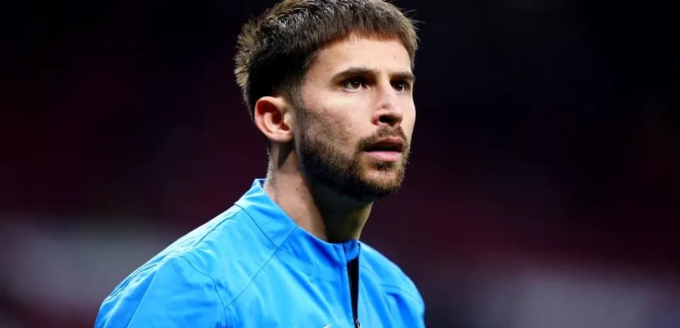 Player in blue training kit at stadium