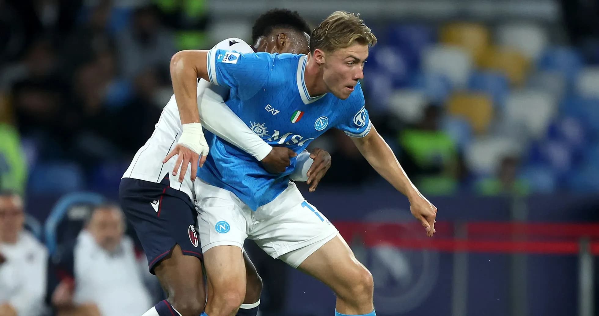 Napoli player tackled by opponent during match
