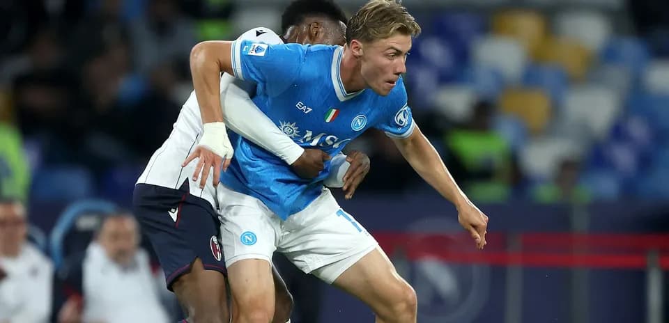Napoli player tackled by opponent during match