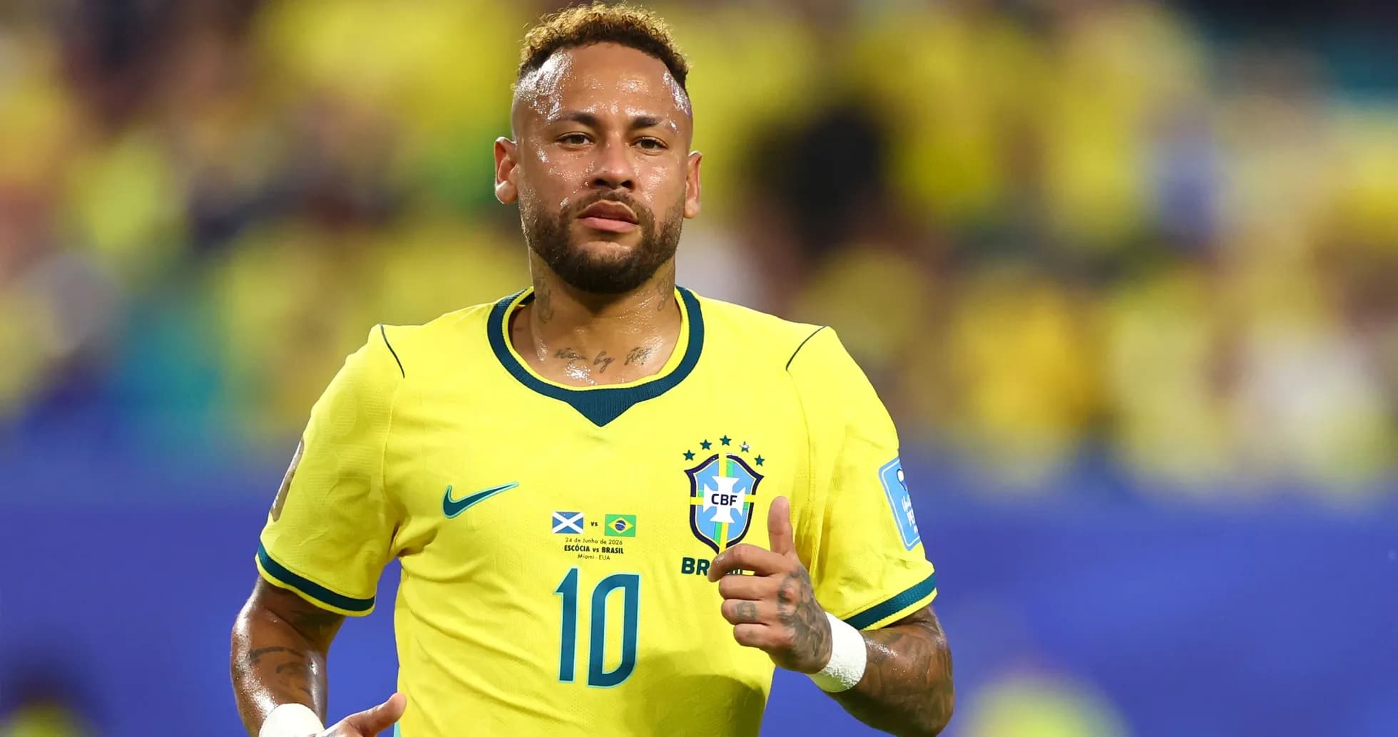 Neymar running in Brazil's yellow jersey during match