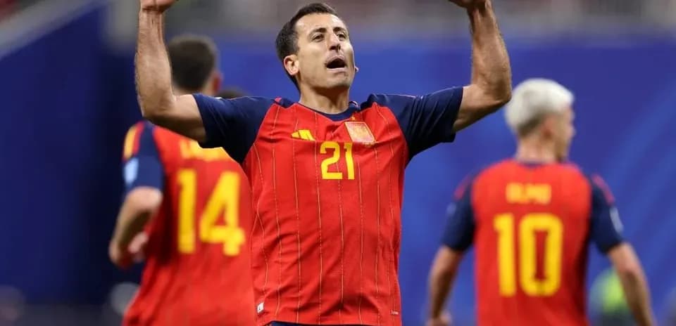 Spanish player celebrating with teammates during match