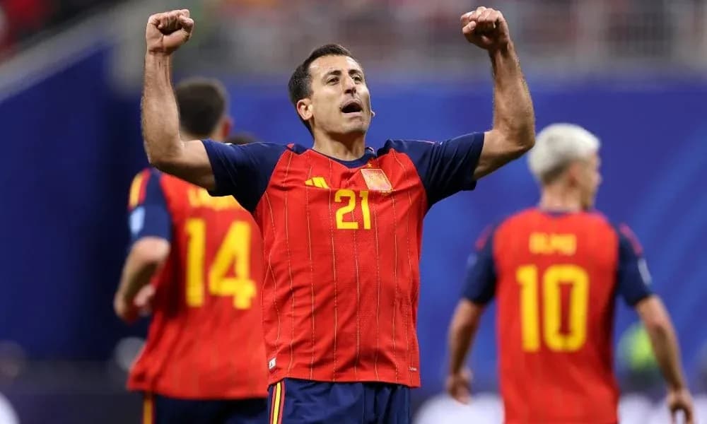 Spanish player celebrating with teammates during match