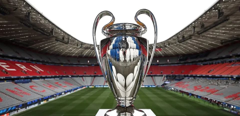 Champions League trophy in empty stadium