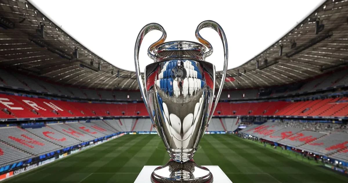 Champions League trophy in empty stadium